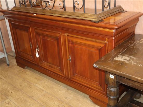 A reproduction French provincial style cherry sideboard W.196cm